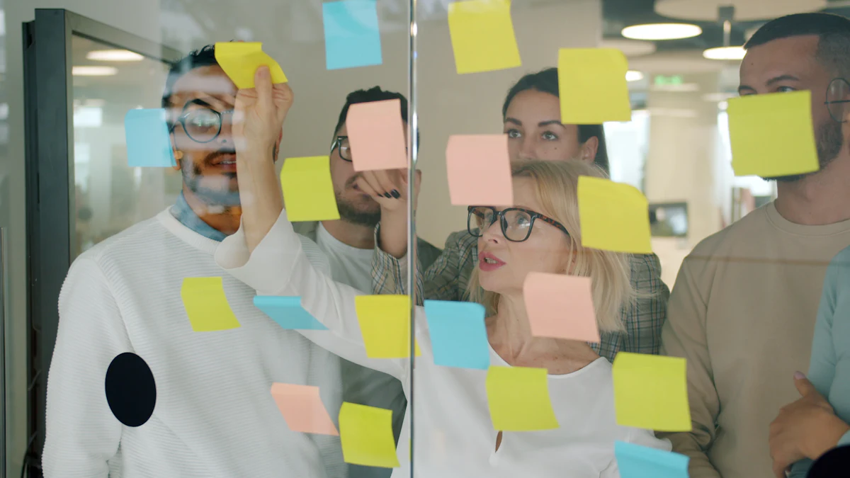 Team planning a project with sticky notes on a glass wall